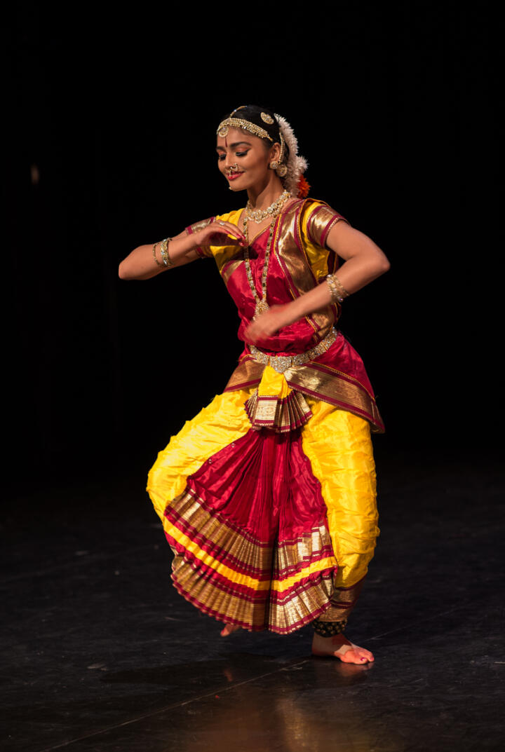 dancer performing in South Asian costume