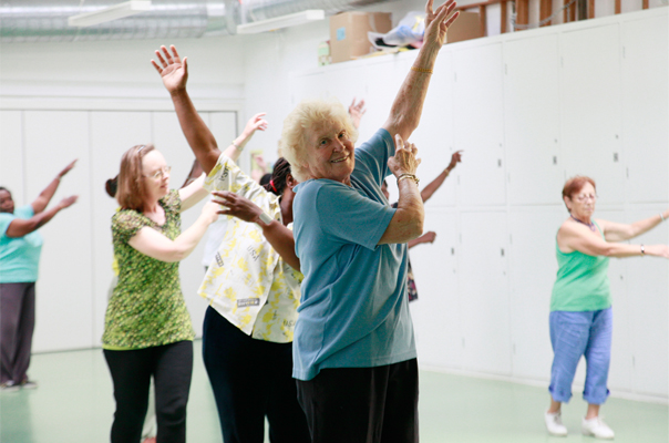 older adults participate in a dance workshop