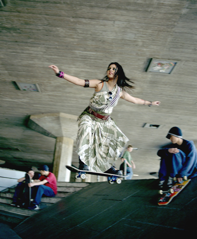 Girl jumping down the famous Southbank seven, at London's historic skatespot.