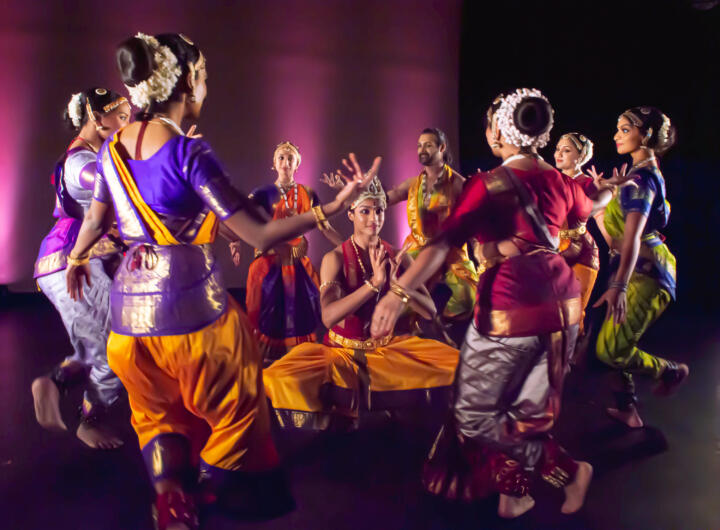 group of South Asian dancers performing
