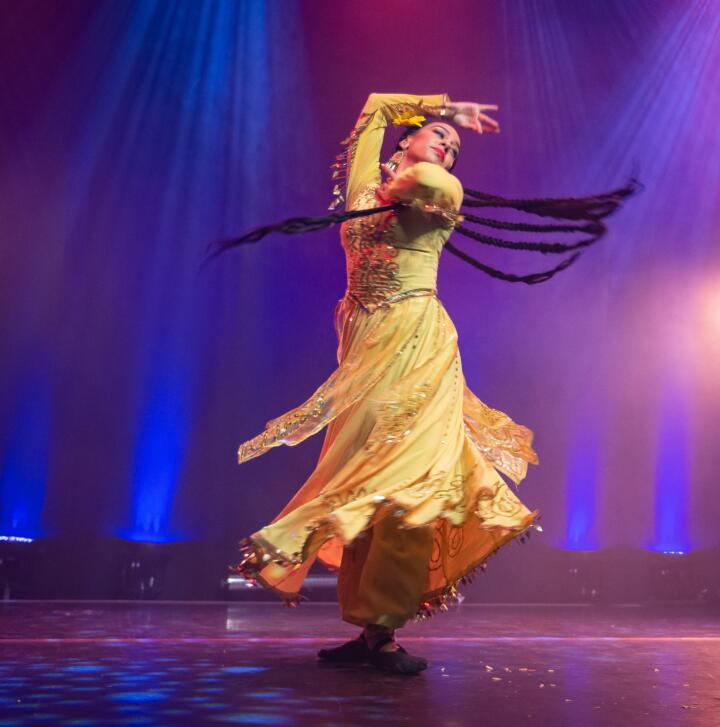 South Asian dancer performing on stage