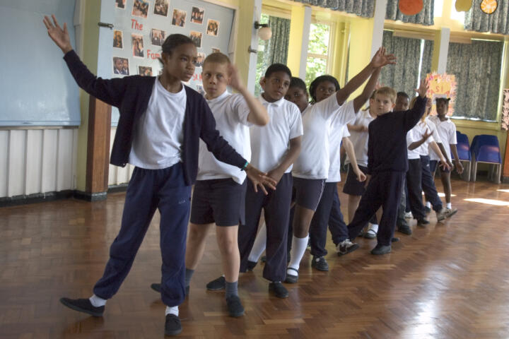 Primary school students participating in a workshop