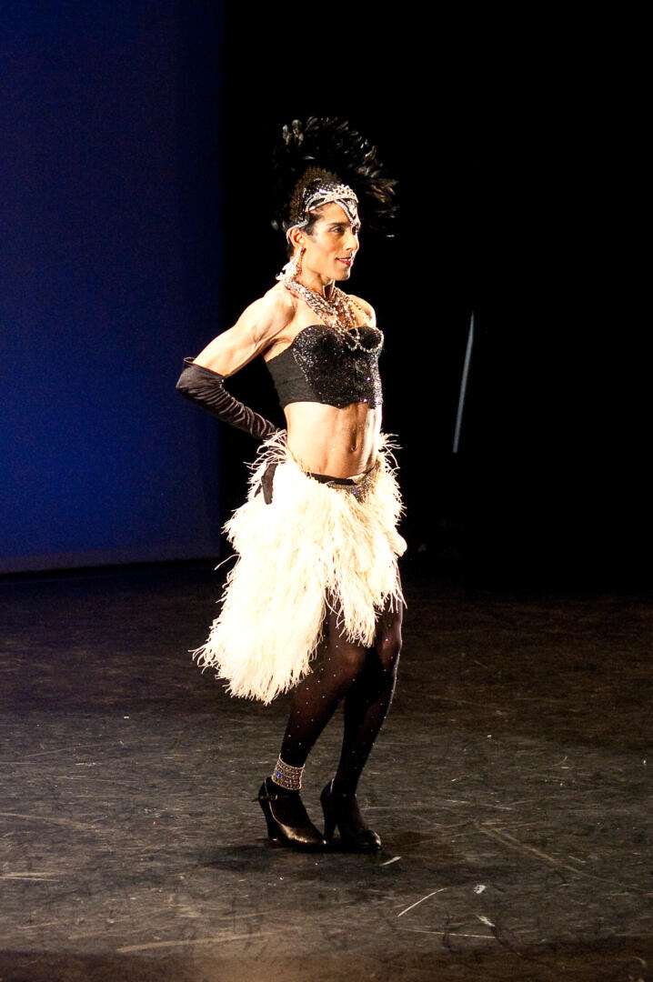 South Asian performer on stage