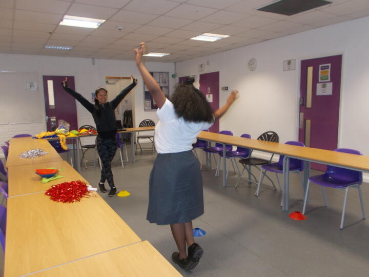 Young people taking part in a dance workshop