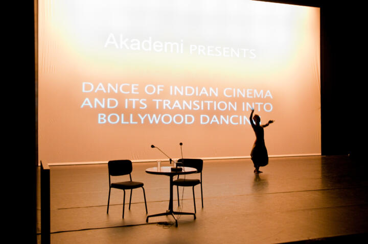 Conference stage and silhouette of dancer