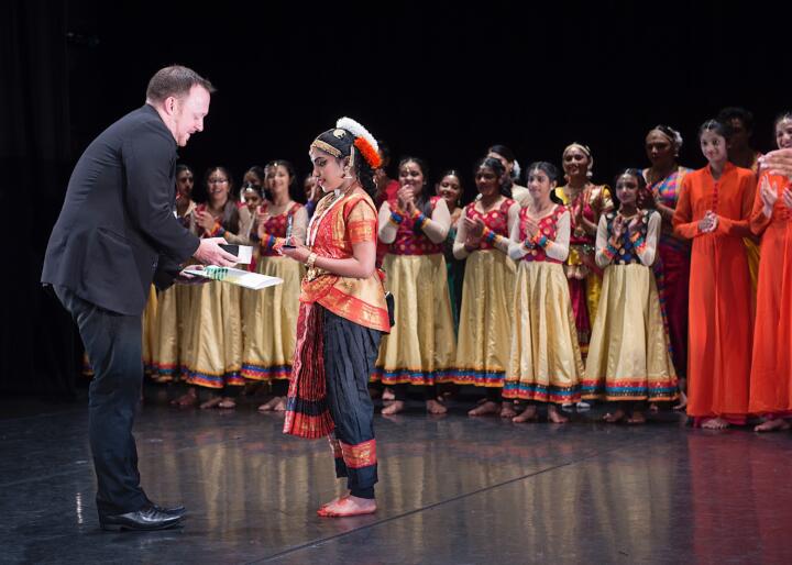 a dancer receives an award
