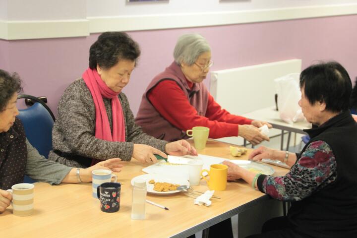 Participants cooking at an Ageing Artfully session