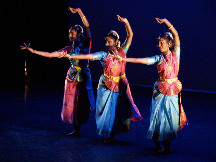 South Asian performers on stage
