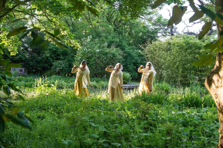 three dancers in an outdoor setting