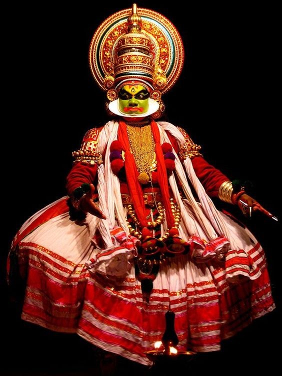 South Asian dancer in ornate theatrical costume