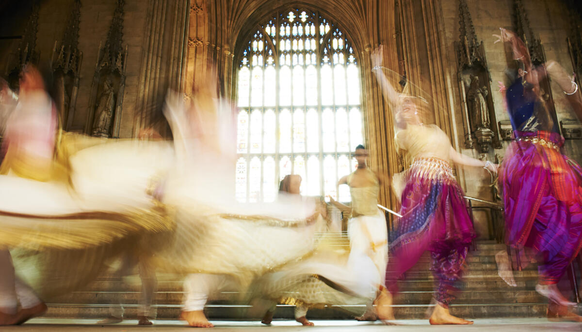 group of dancers perform in Westminster Hall