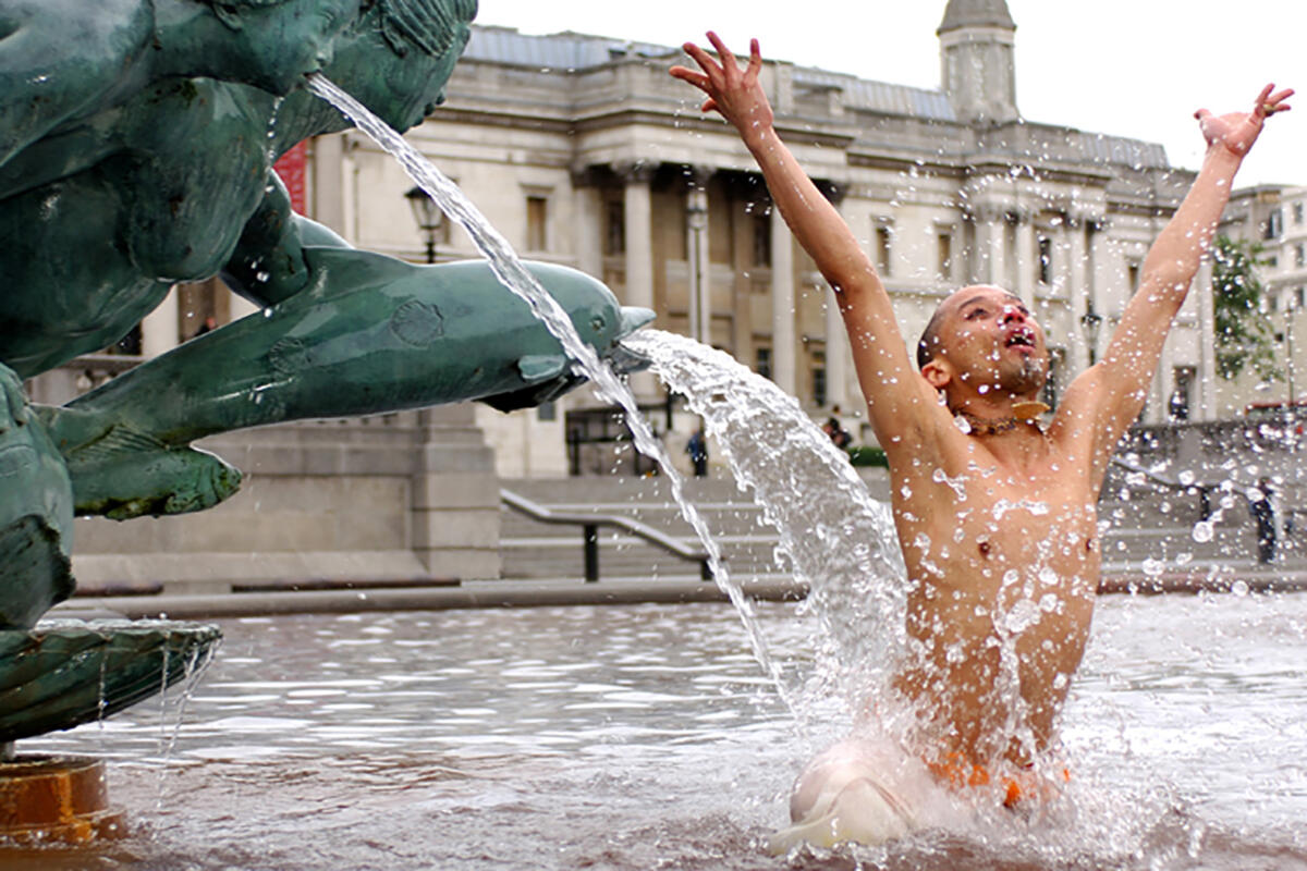dancer performs outdoors in a fountain