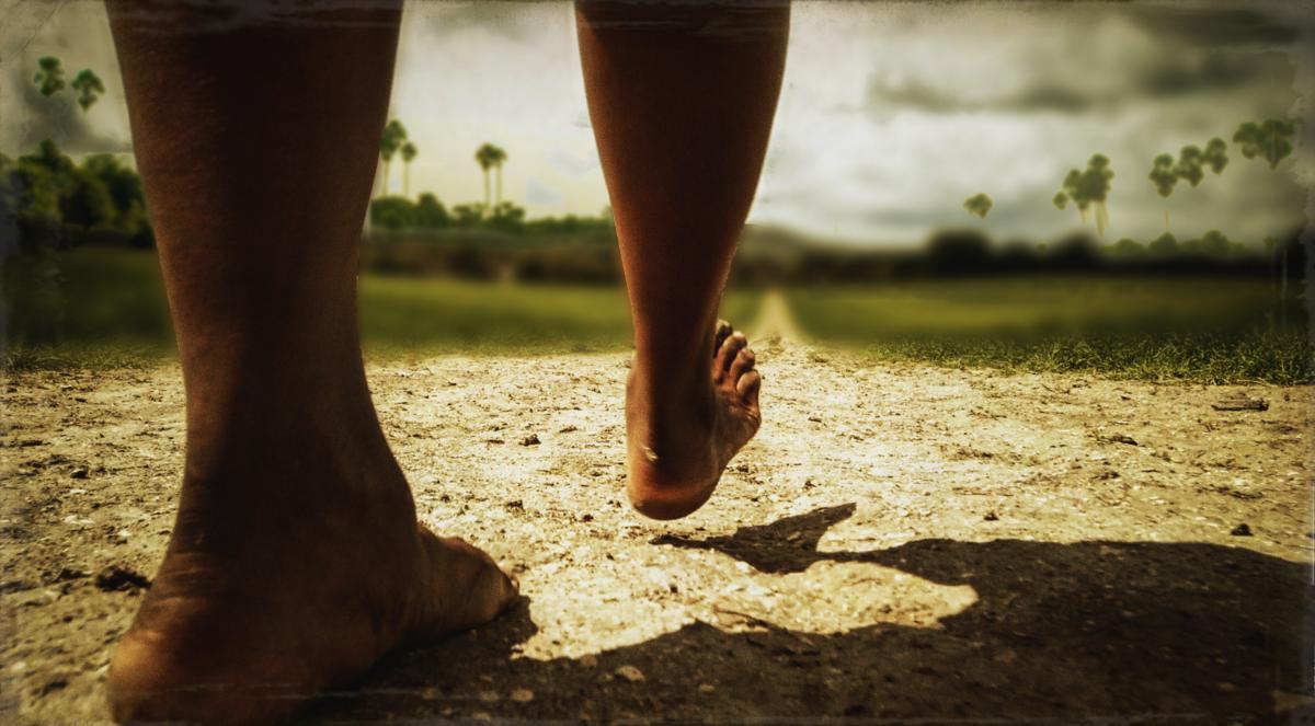 bare feet walking on earth