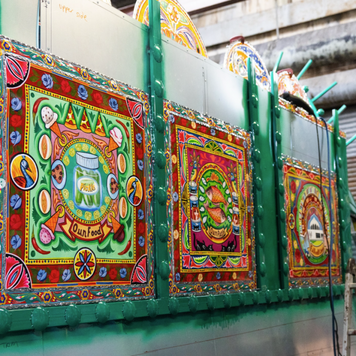 Colourful patterns on the side of a truck.